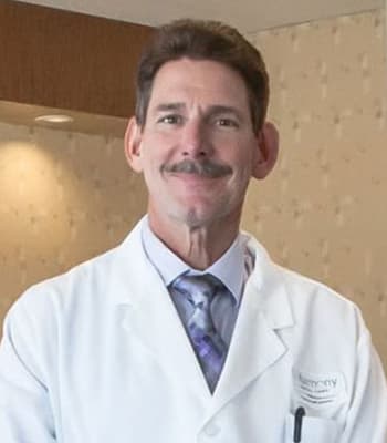 Dr. Alex Darrach-Cottick